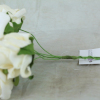 side view of the ivory foam rose bunch
