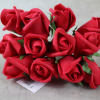Front View Of The Red Curled Rose Bunch