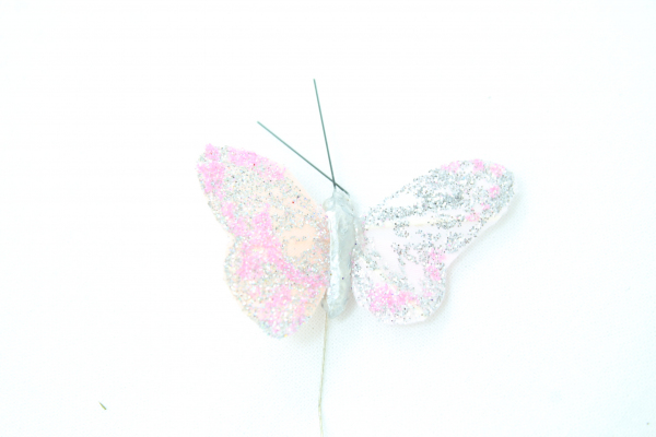 Covered in Glitter, our pink butterfly.