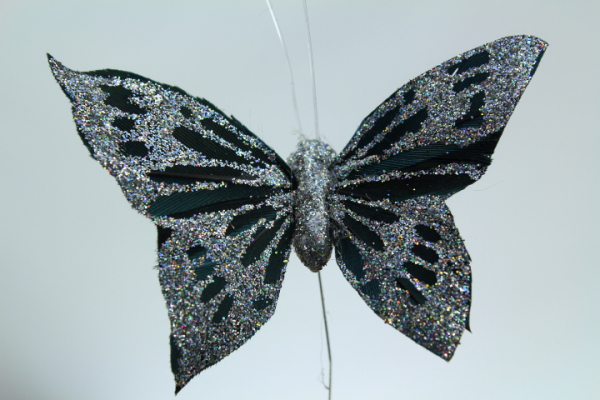 Our Silver Butterfly table, cake or flower decoration price on a wire stem.
