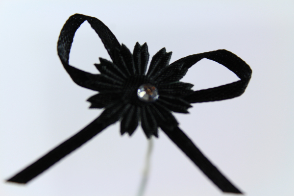 Black daisy ribbon bow perfect for gothic weddings