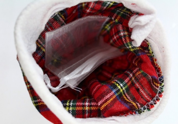 Tie up favour bag inside the mini Tartan Dress.